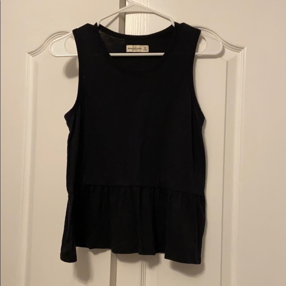 sleeveless top with flared bottom